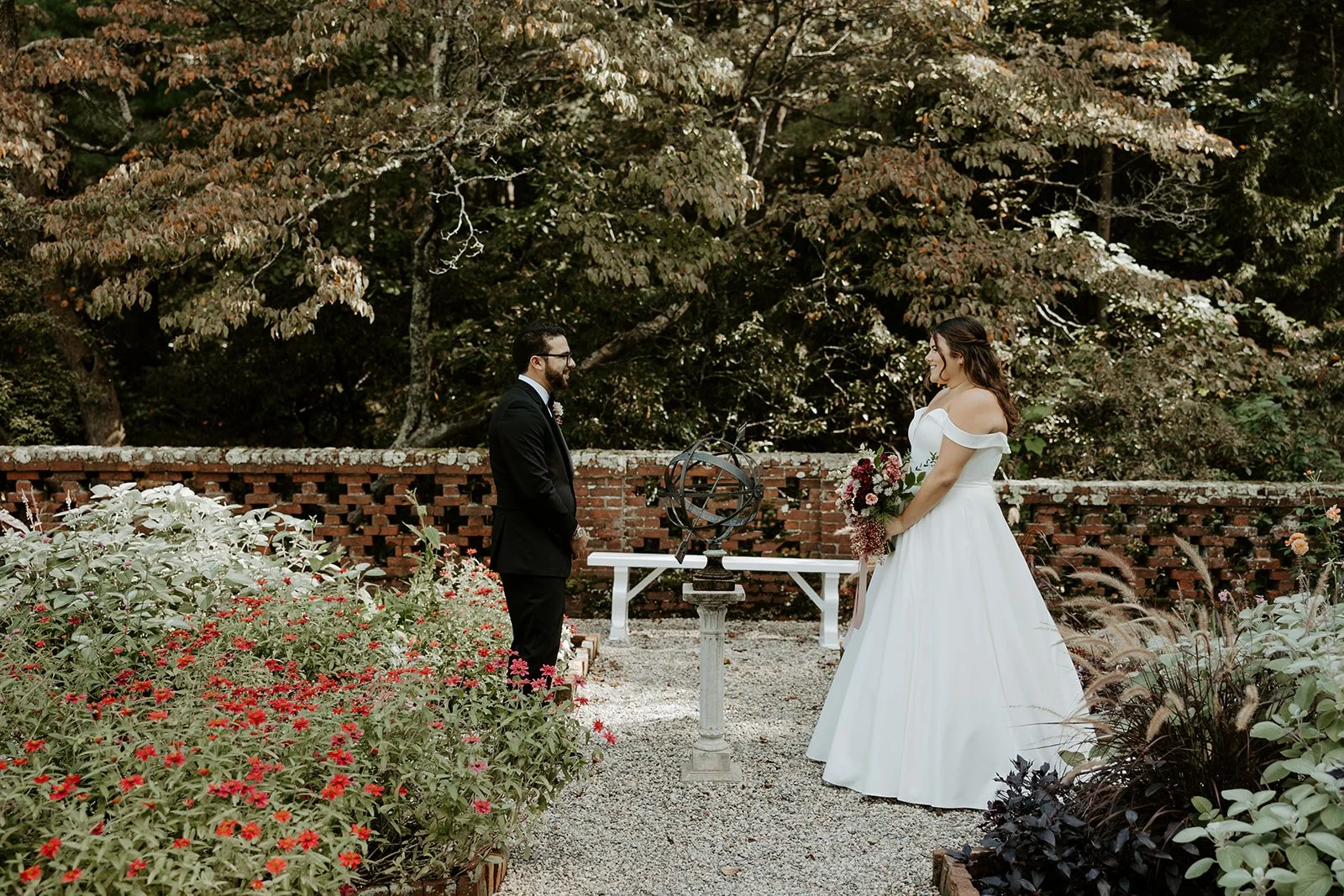 A bride and groom in the gardens at the bradley estate