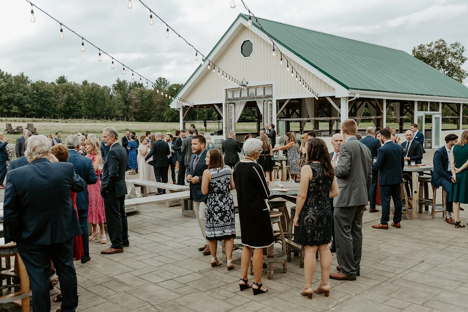 Guests outside at a cocktail hour at a Massachusetts wedding venue