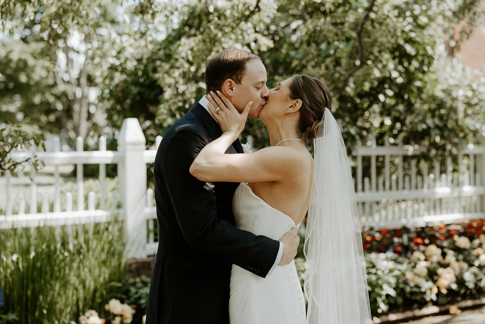 A bride and groom kissing