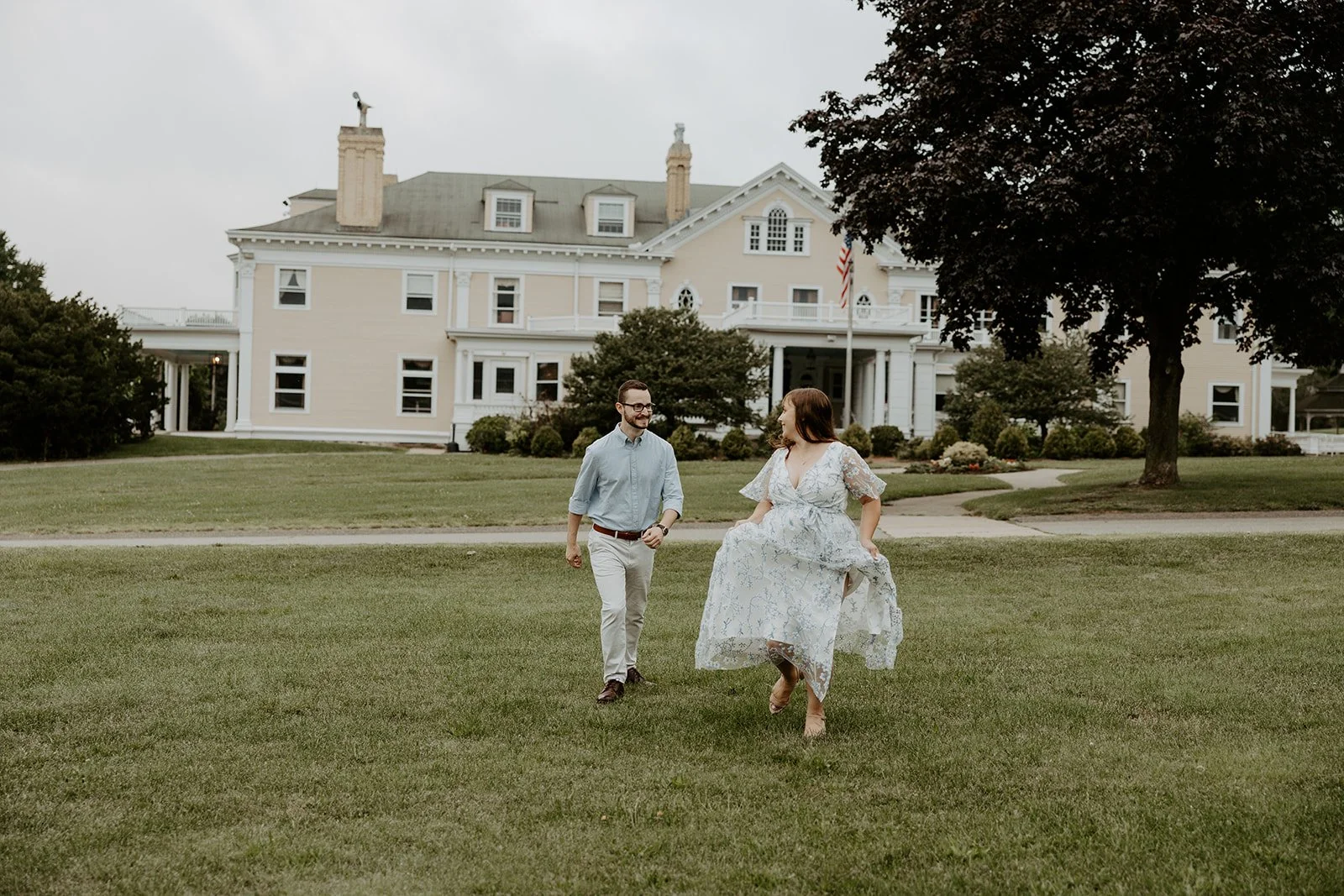A couple taking Massachusetts engagement photos at Endicott Estate