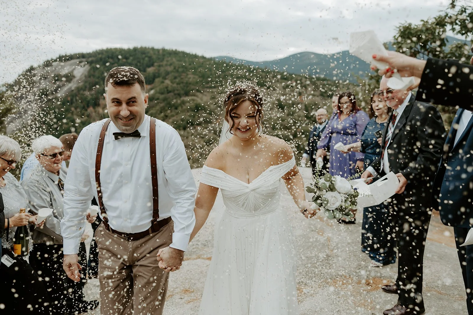 A bride and groom leaving their elopement ceremony