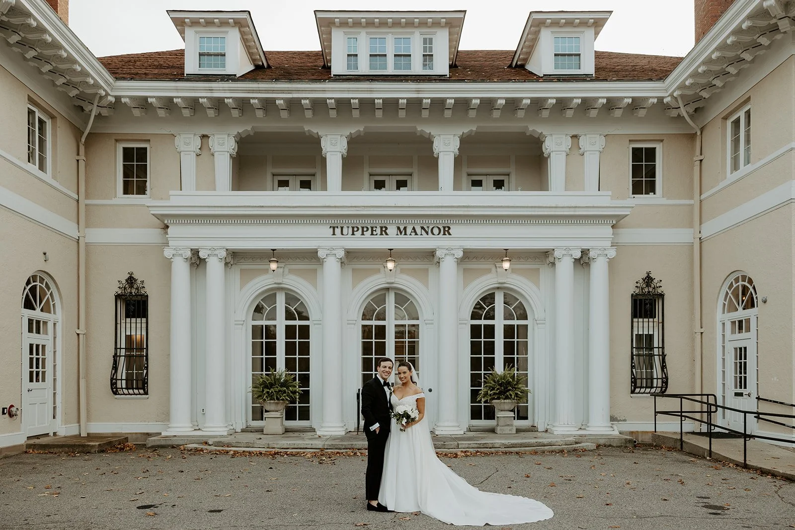 A bride and groom at their estate wedding venue
