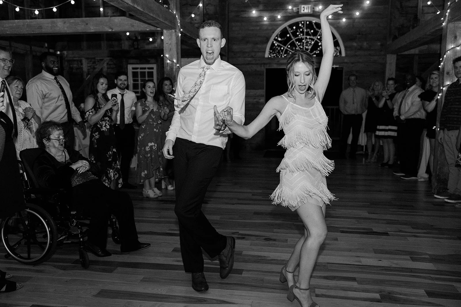 A bride and groom dancing at their wedding reception