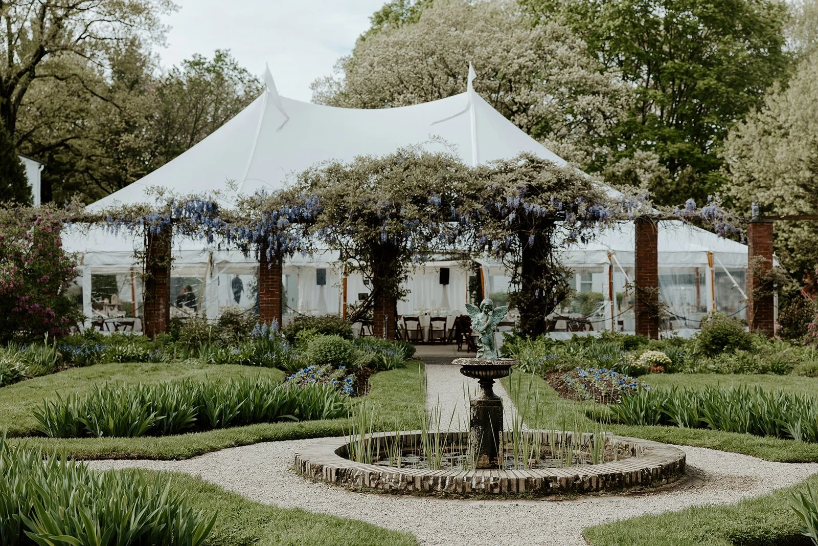 A wedding reception tent setup at Glen Magna Farms