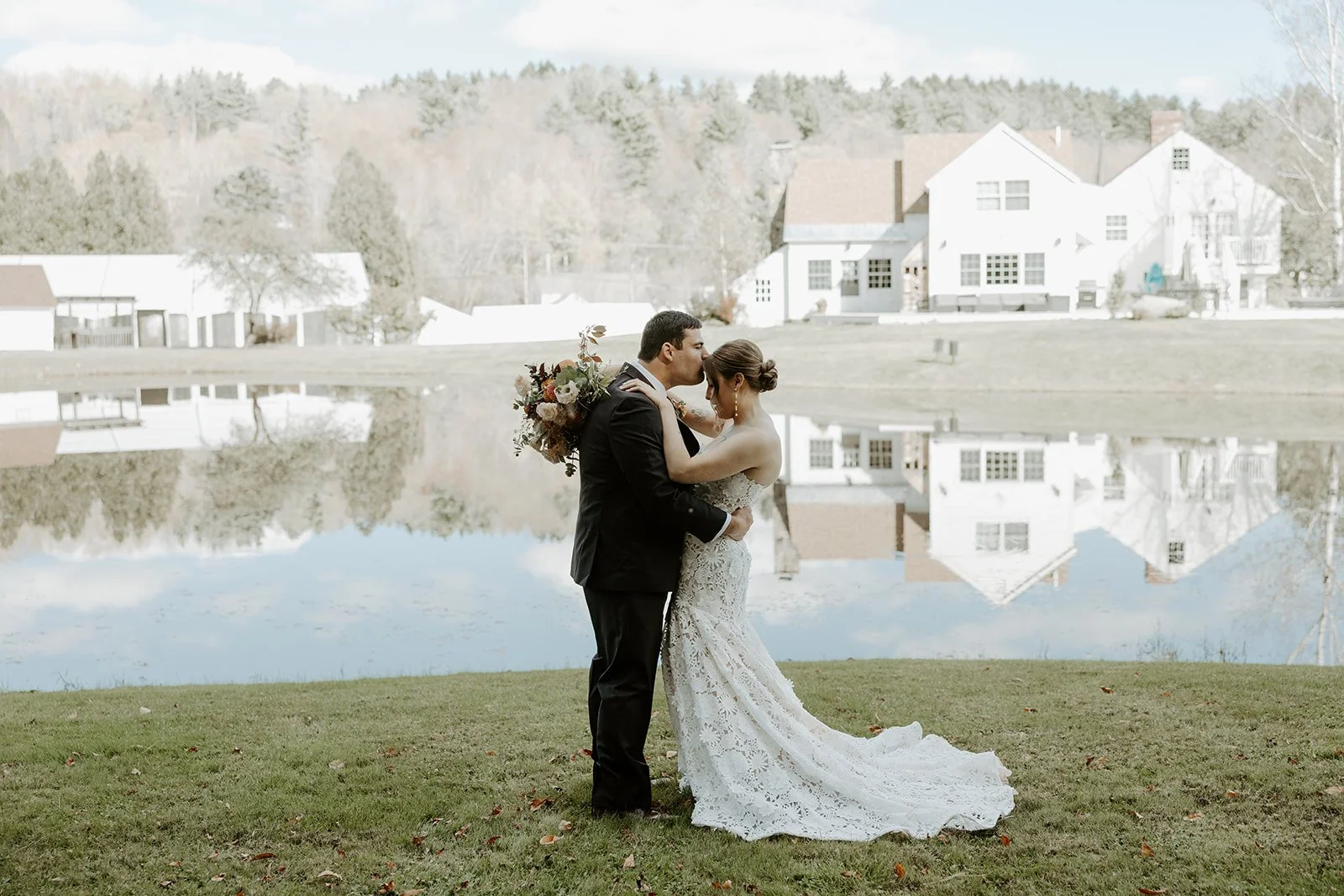 A couple taking fall wedding photos at Farm Road Estate