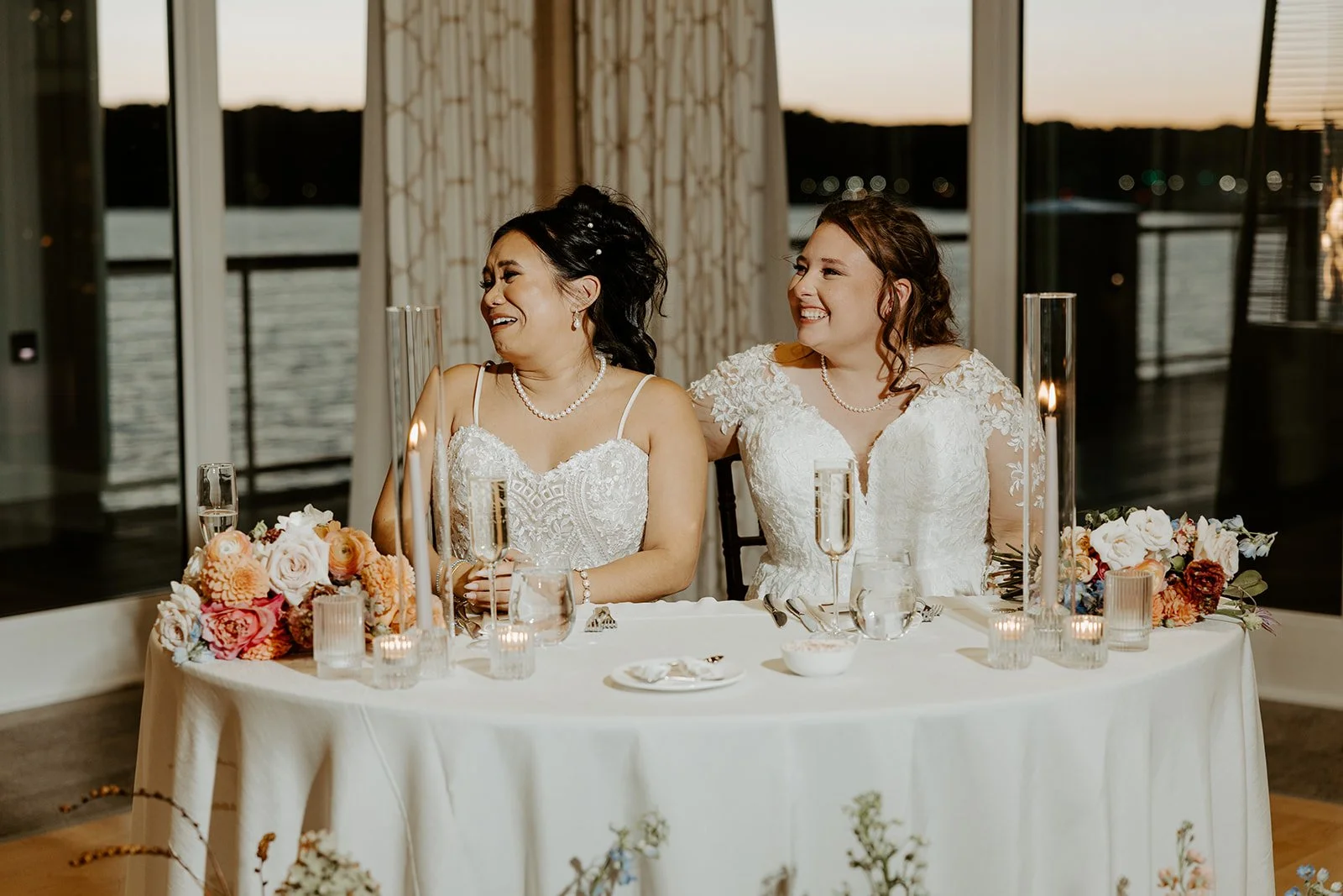 Two brides at their wedding reception