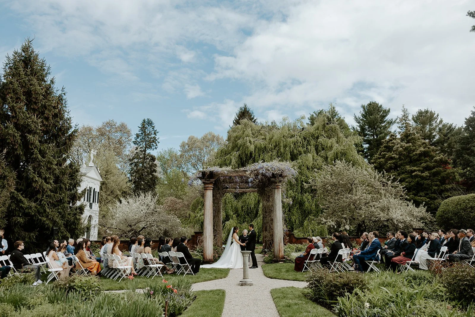 A wedding ceremony at estate wedding venue Glen Magna Farms