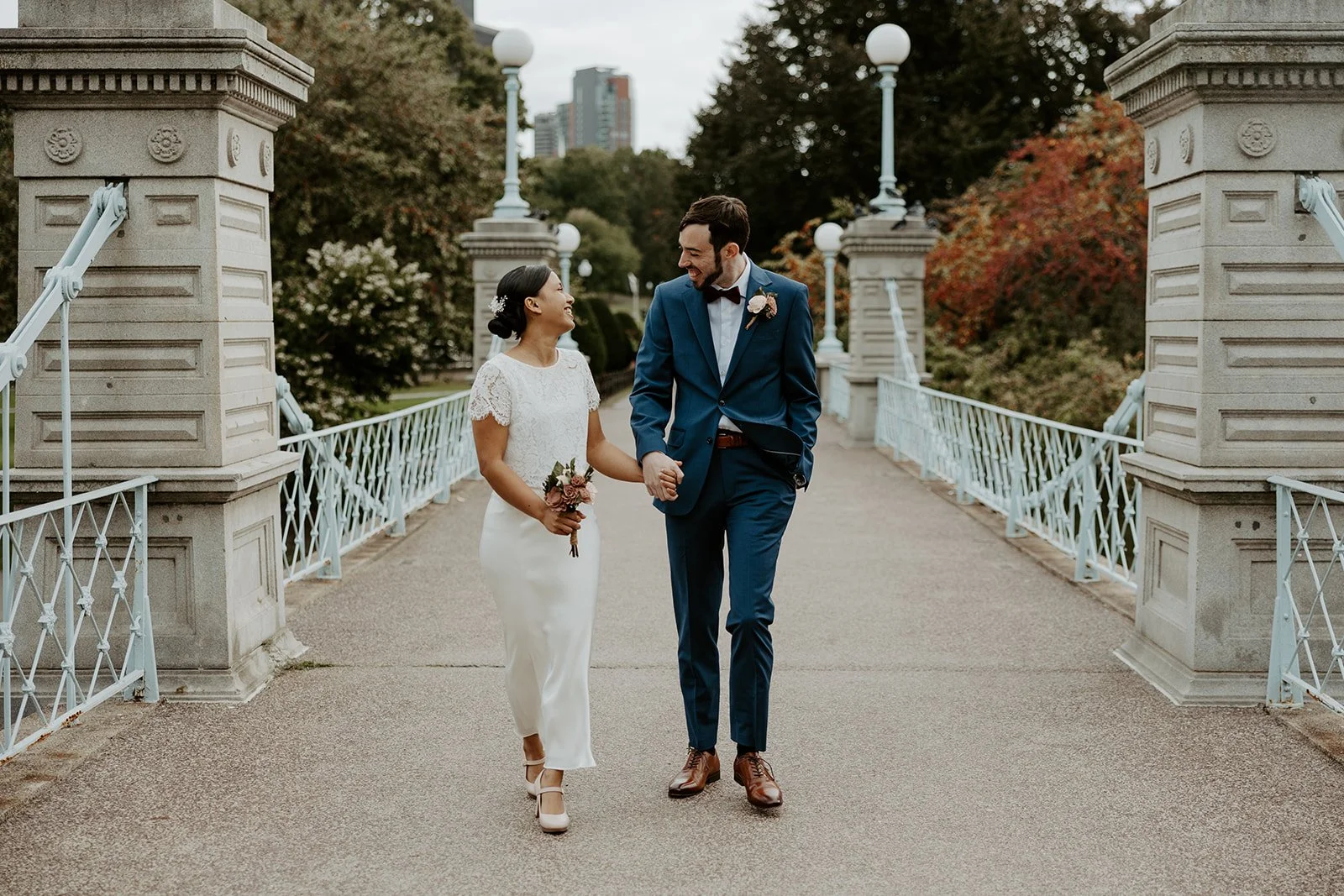 A Boston elopement couple taking portraits after their Boston Public Library wedding