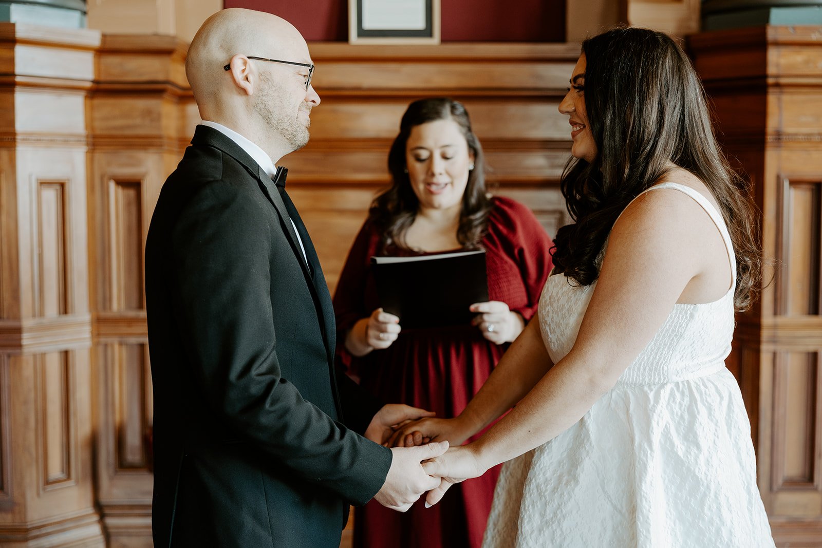 A bride and groom during their city hall elopement in a blog on how to plan an elopement
