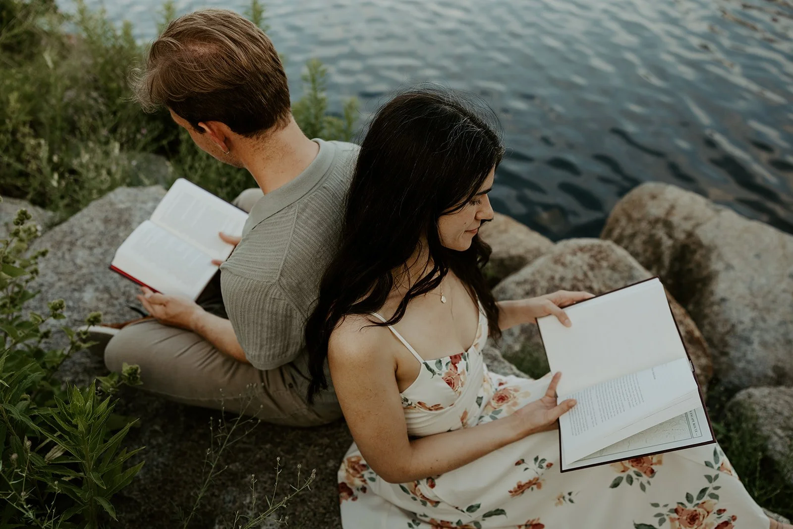 A couple having a reading date for engagement photos