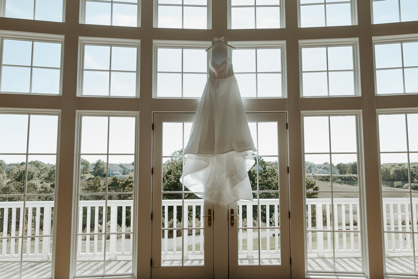A wedding dress hanging up in Waverly Oaks
