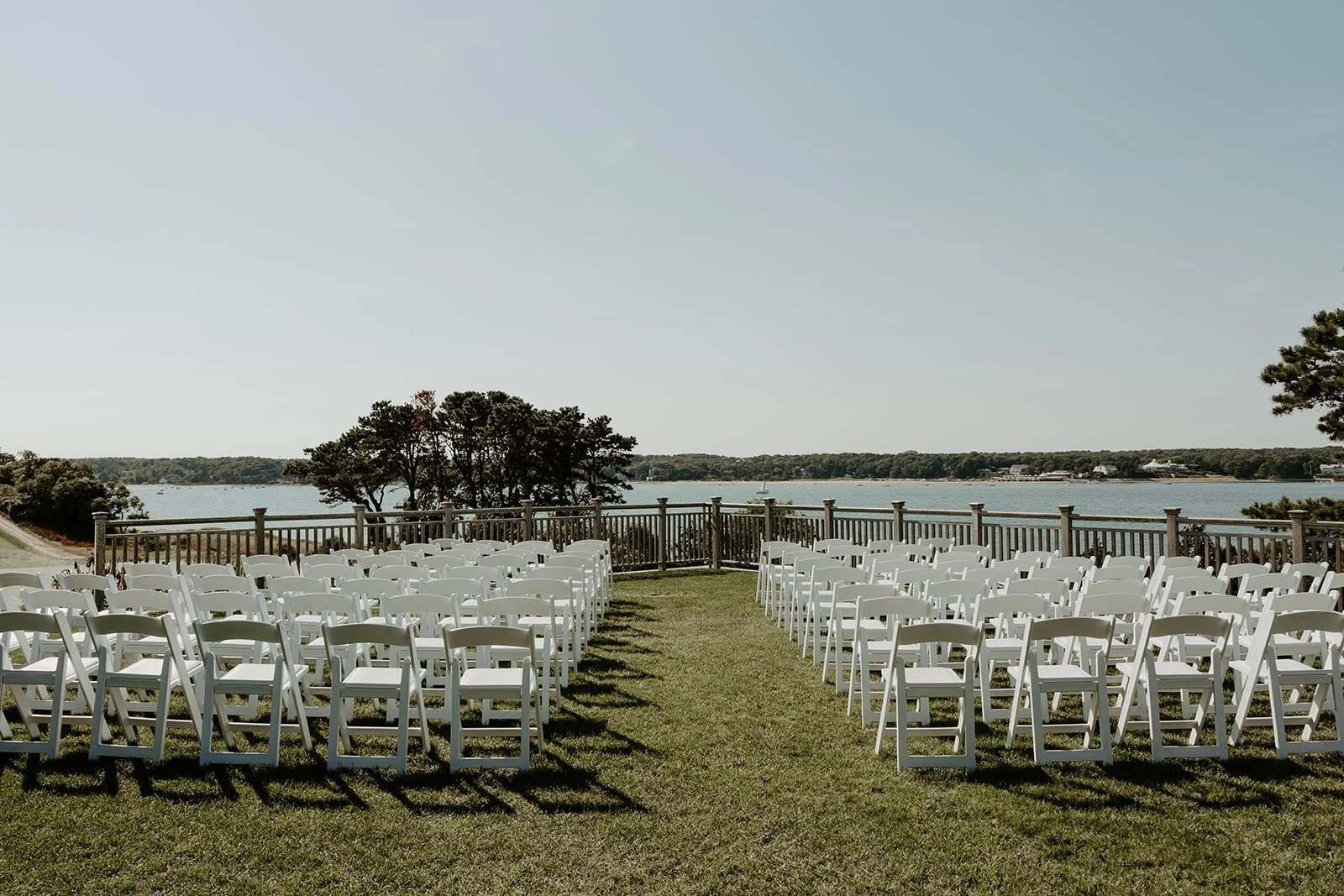 A wedding ceremony set up for a wedding at cape cod wedding venue eastward ho!