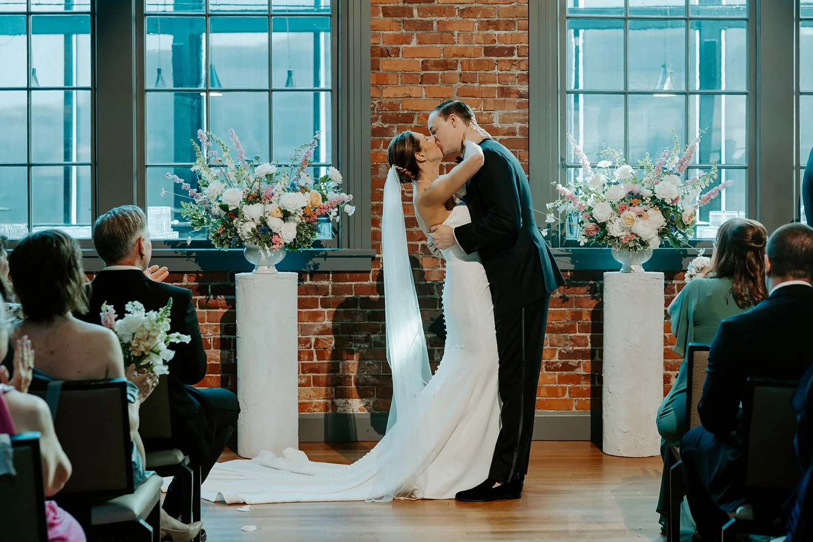 A bride and groom's first kiss