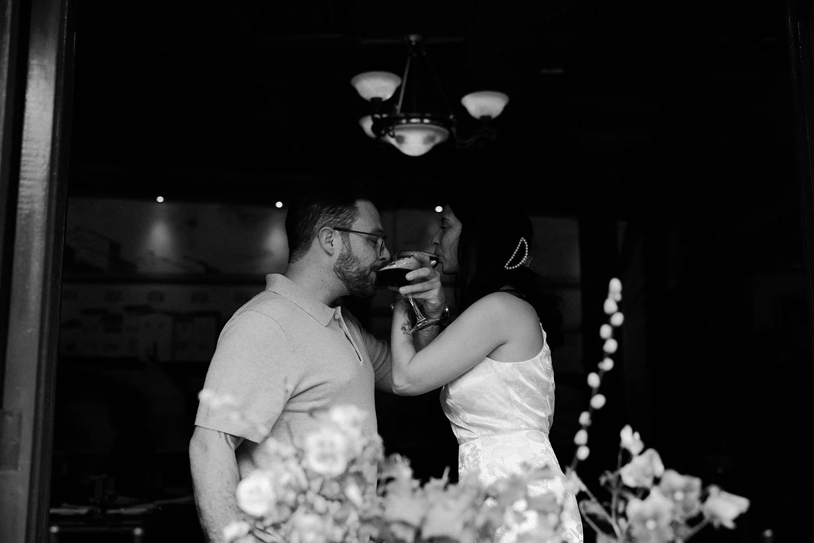A couple drinking espresso martinis