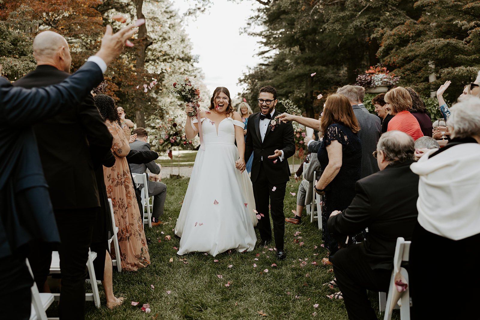 A bride and groom celebrating their Bradley estate wedding ceremony