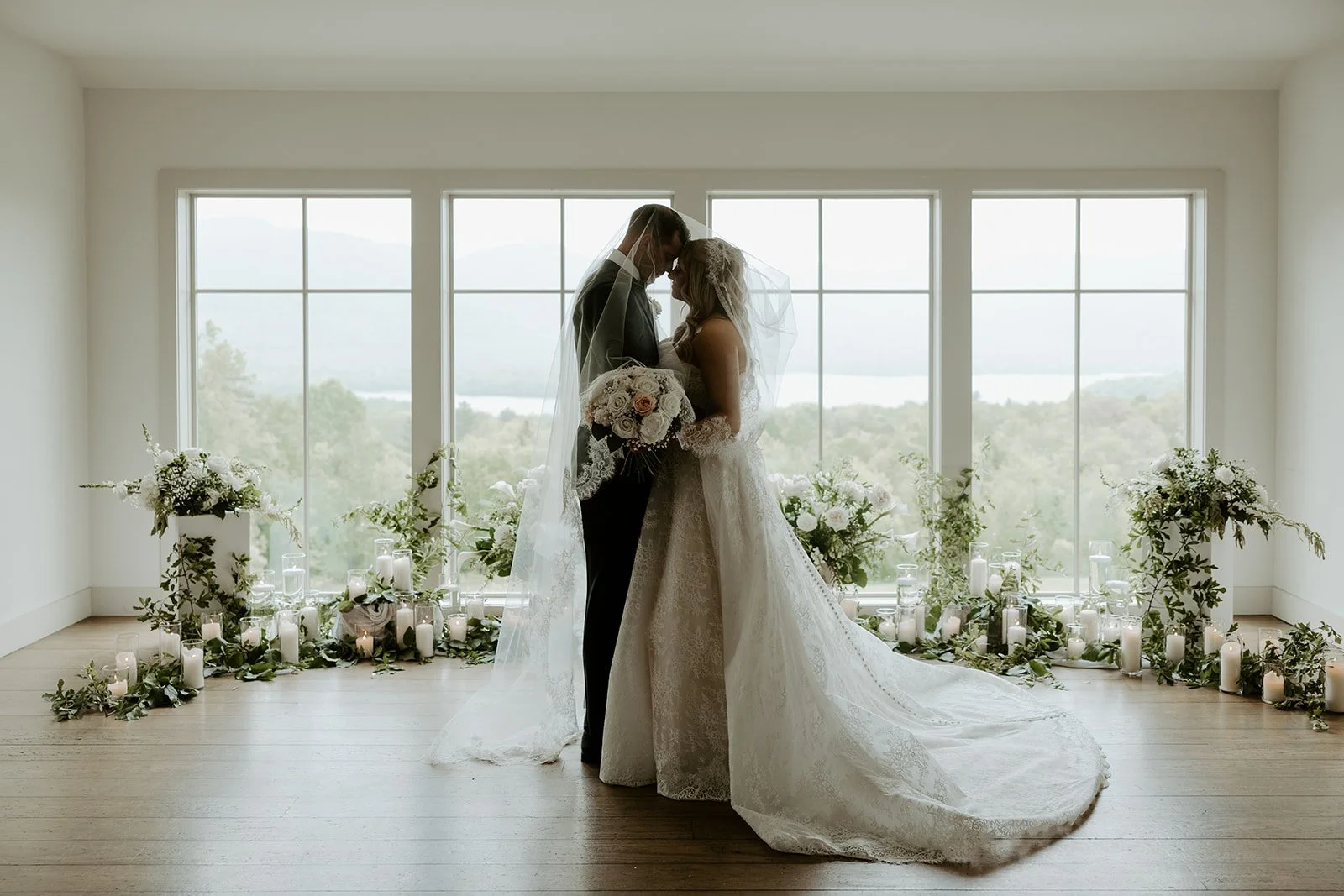A bride and groom taking wedding photos