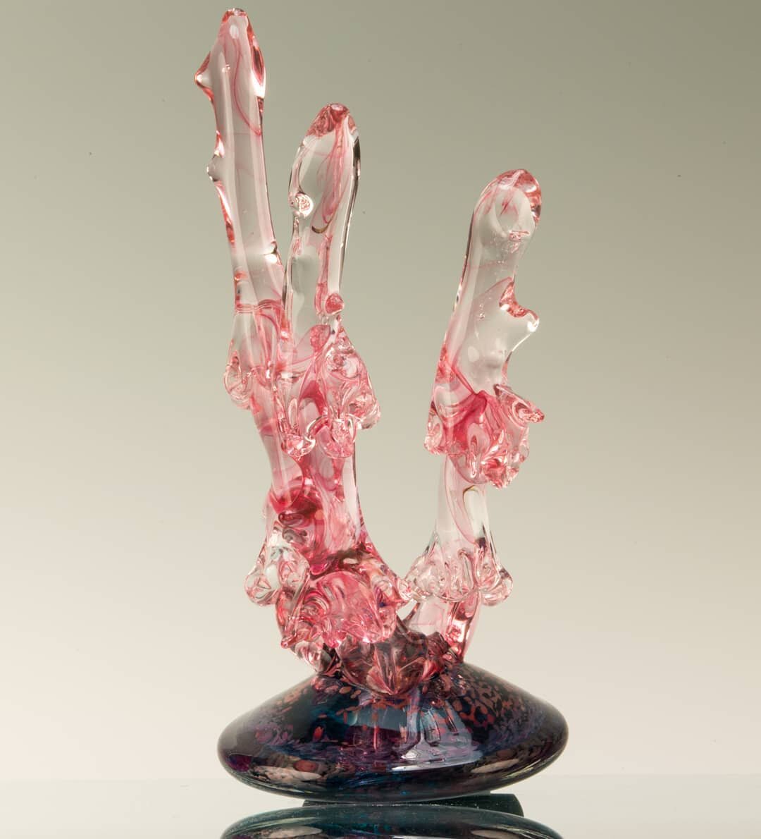 Reef-inspired coral sculpture made with gold-ruby glass. About 10 inches tall. DM to purchase. 🐚 Photo by Brian Lewis #glassblowing #glass #coral #sculpture