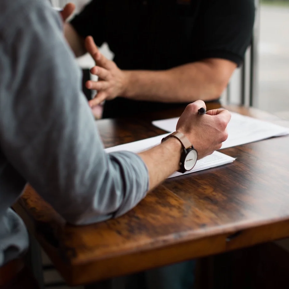 Hands of Man Interviewing Custom Software Developer