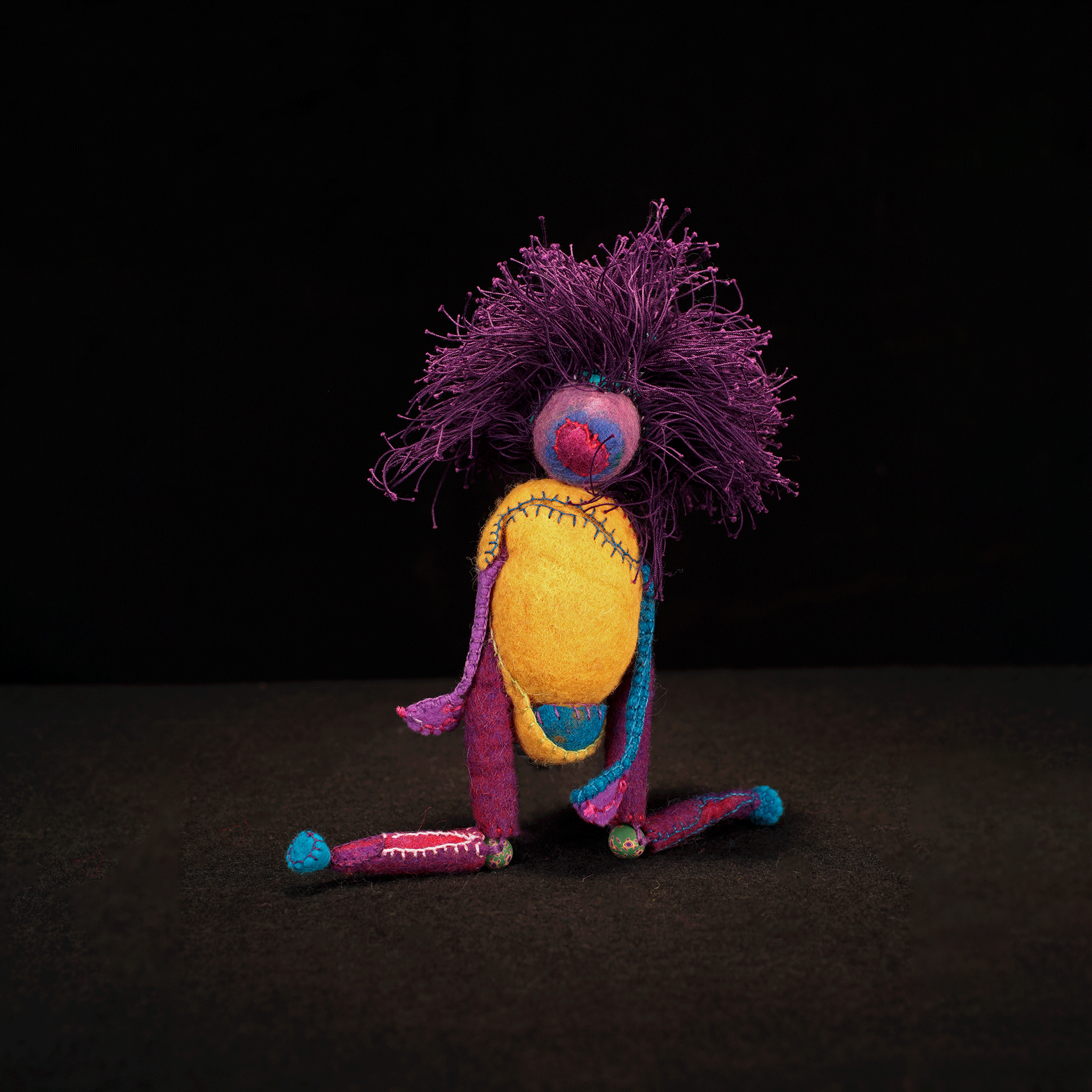 “Rhea, Short for Menorrhea” 5” W x 18” H x 5” D 100% hand dyed wool fiber, perle cotton thread and beads.