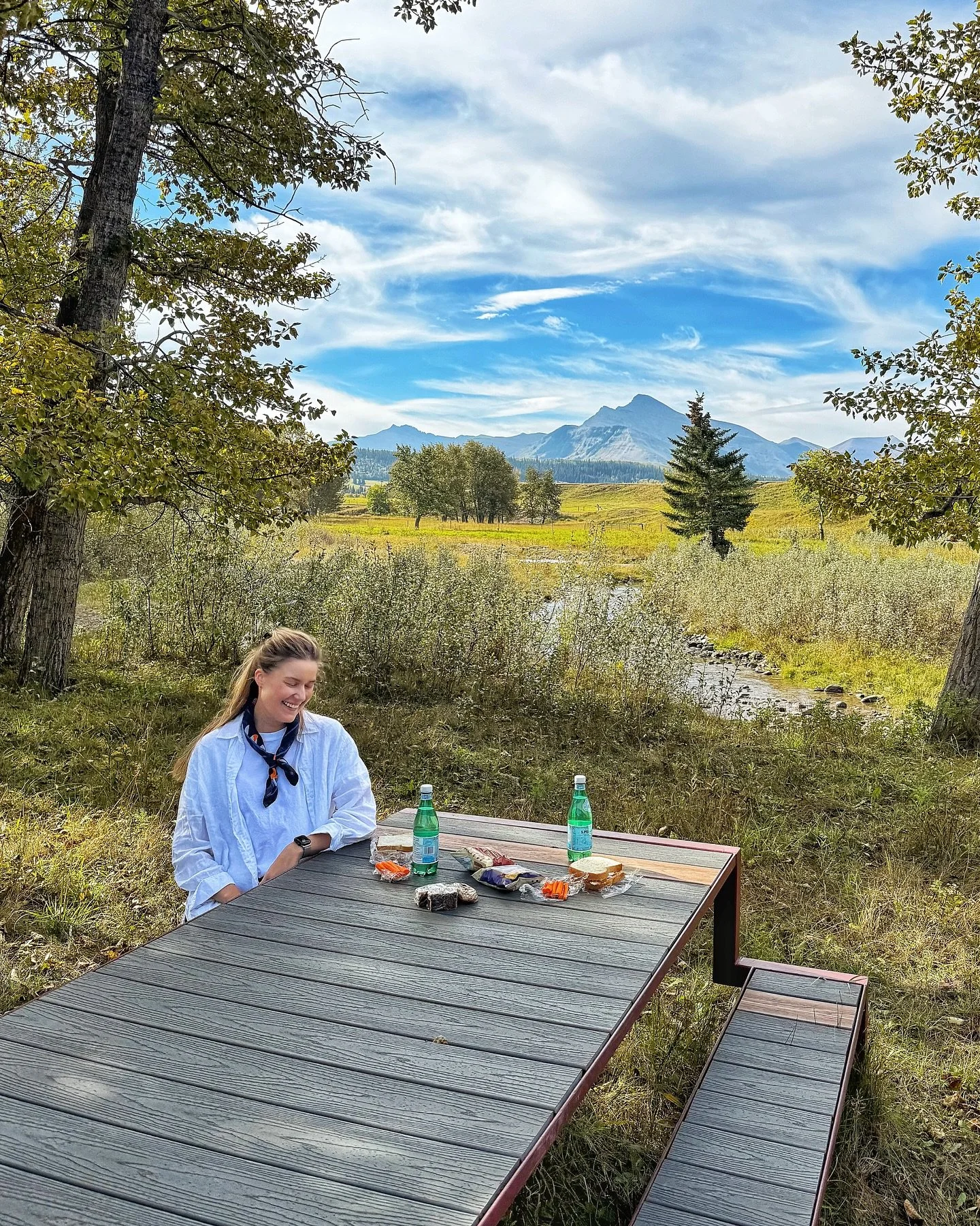 No matter what else is going on, this place just hits reset. 
Picnic by the creek, views for days &mdash; what a spot. 🌿💛
:
#PincherCreek #AlbertaAdventures #CreeksideMagic #PicnicVibes #ScenicViews #NatureGetaway #StayInAlberta #AlbertaLodges #Hid