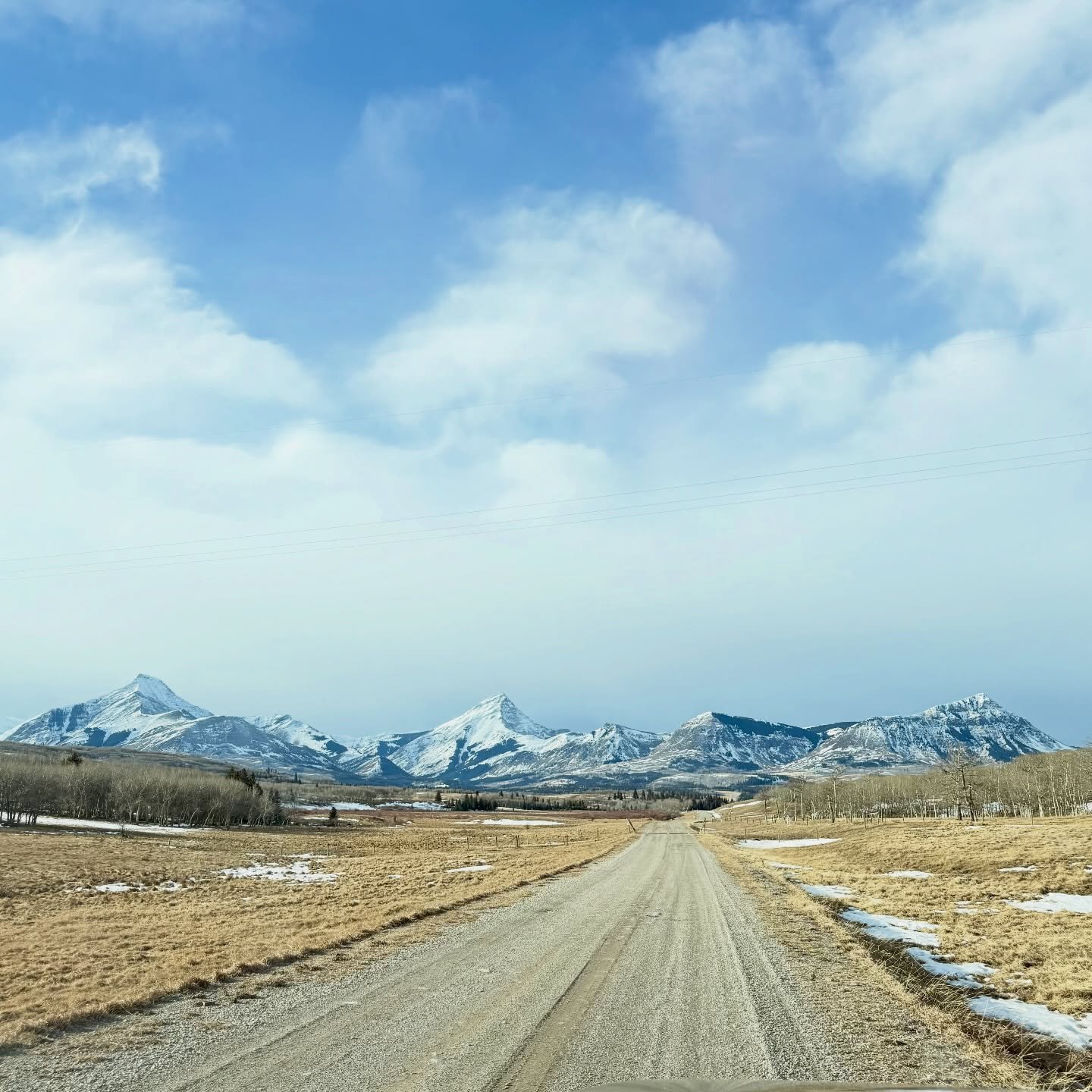 An appetizer: the opening montage to a great show.
The driveway into The Lodge at Thanksgiving Ranch. 

#OpeningMontage
#RanchExperience
#CinematicDrive
#MountainRoad
#RanchLife
#WesternEscape
#ScenicArrival
#RoadToNowhere
#WideOpenSpaces
#Destinatio