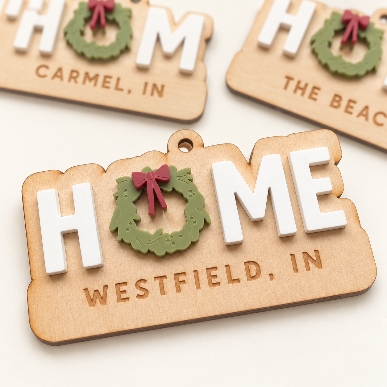 Personalized HOME location Christmas ornaments with custom city and vacation destinations.png
