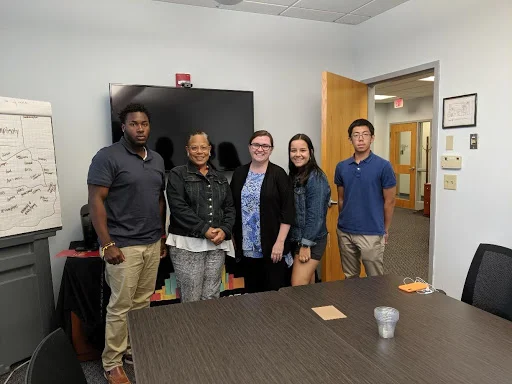 A session with emerging leader consultant, Rev. Sarah Strosahl-Kagi (center).