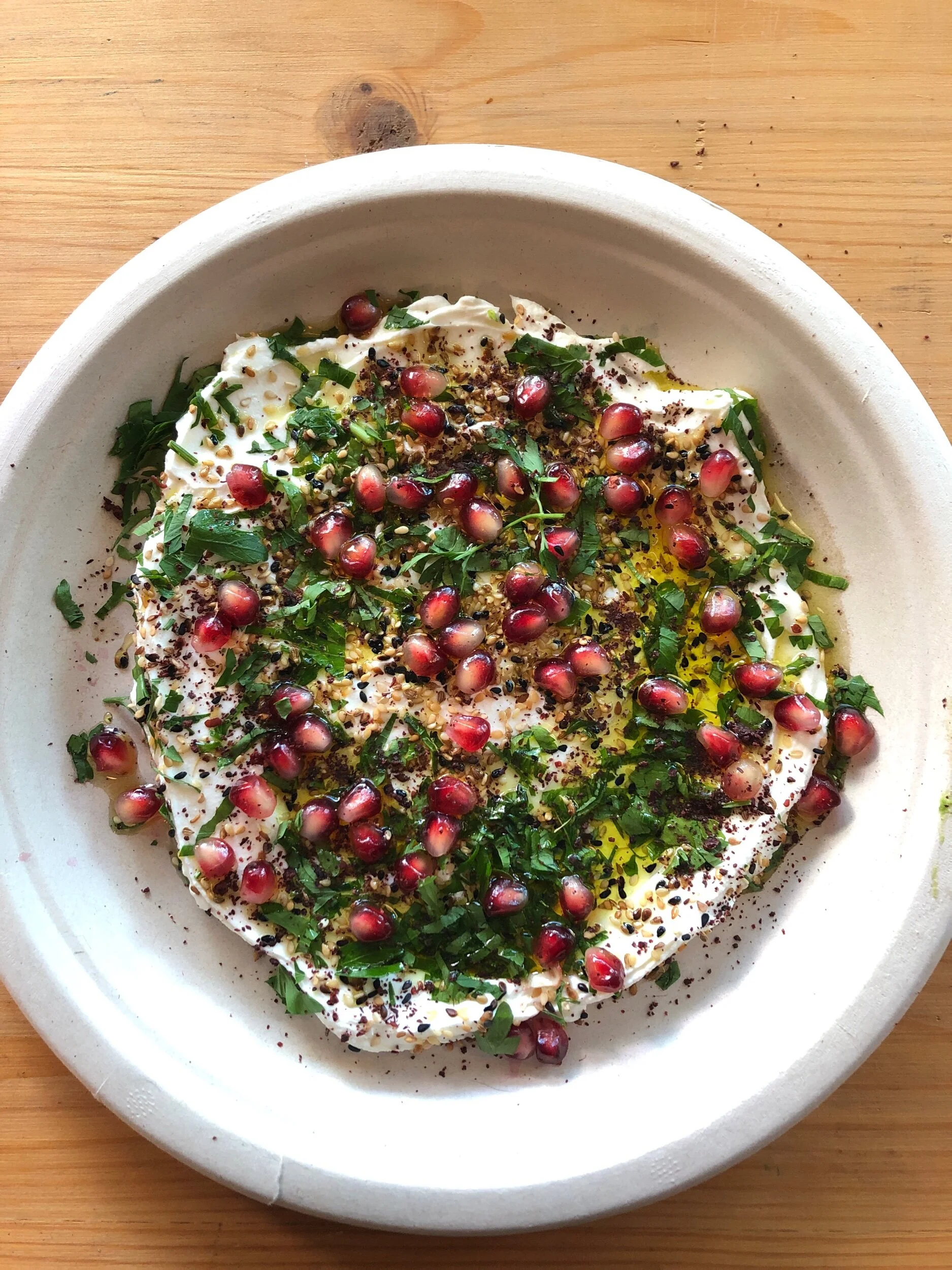 Labneh with nigella, sumac, anise seed, pomegranate, sesame seeds & parsley