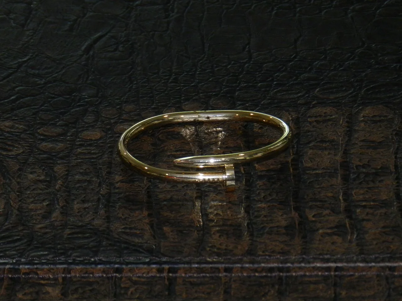 Our version of the Juste Un Clou Nail Bracelet. Made of Gold Plated Stainless Steel.  Fits Wrists Size: 7.5”