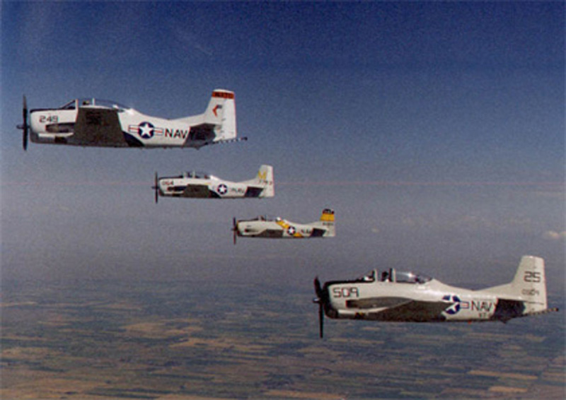 North American T-28 Trojan with other airplanes