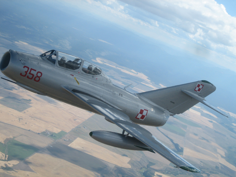 Mikoyan-Gurevich MiG-15 over fields