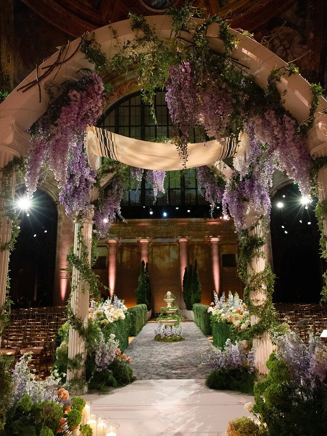 This is our version of a Tuscan garden imagined for Casey and Jacob&rsquo;s wedding. Complete with custom marble statues, hanging wisteria, a water fountain and more. Before this year&rsquo;s Met gala theme this was our way of bringing Italian garden