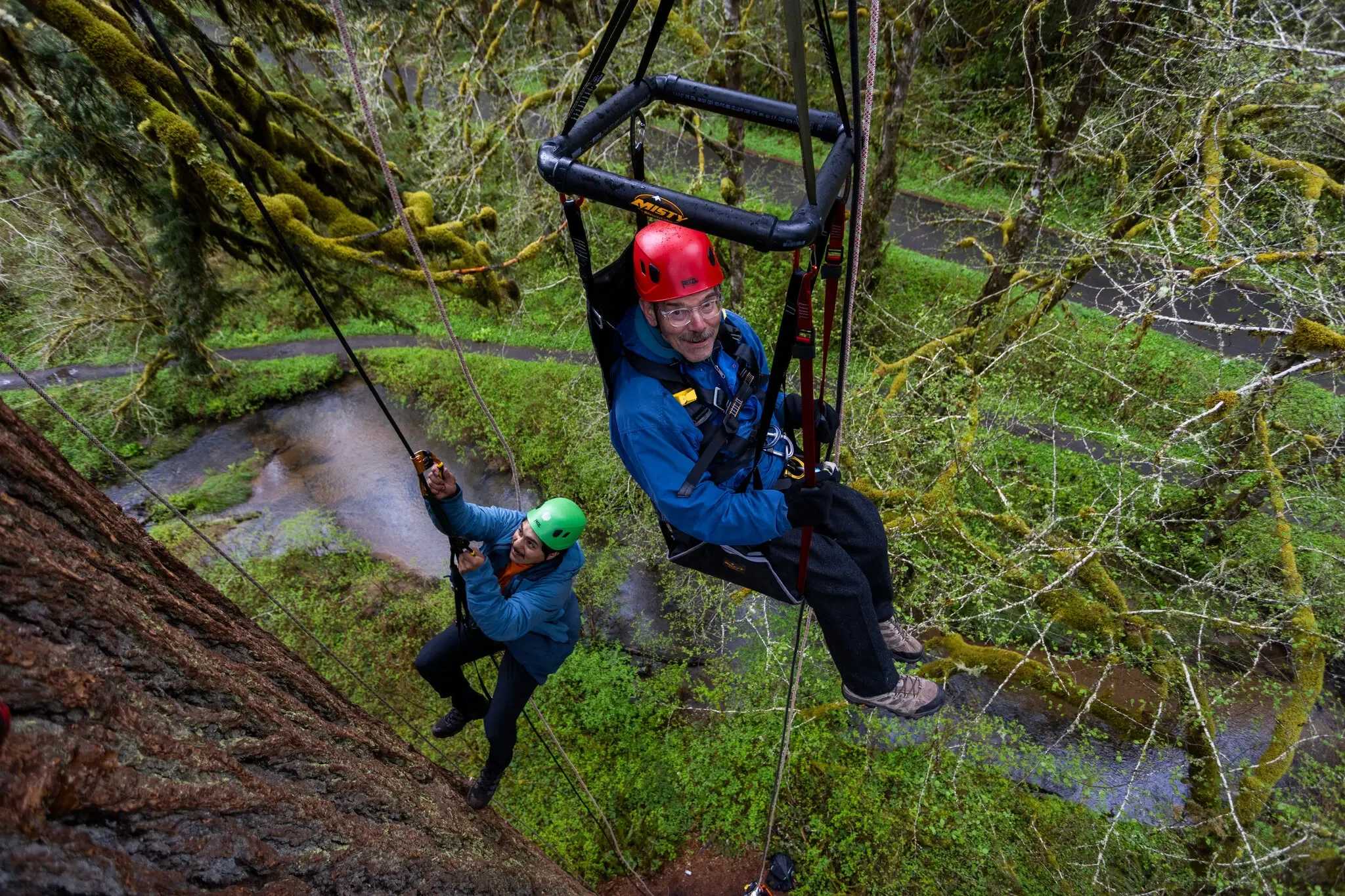 Geoff Babb with Ramon Moreno, one of the workers assisting with his climb in his AdvenChair.
