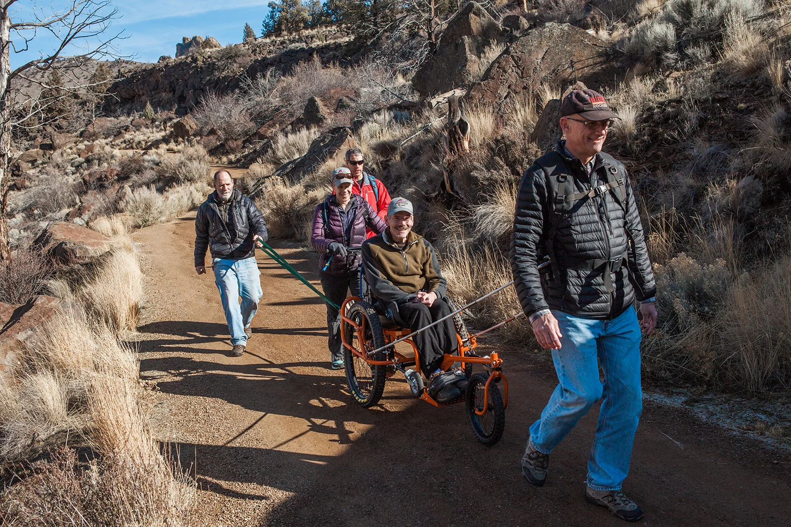 Amy Kazmier is on the disc brakes to safely descend into the park, with Dave Green and Kirk Metzger as backup on nylon straps and Brian Tandy on lead.