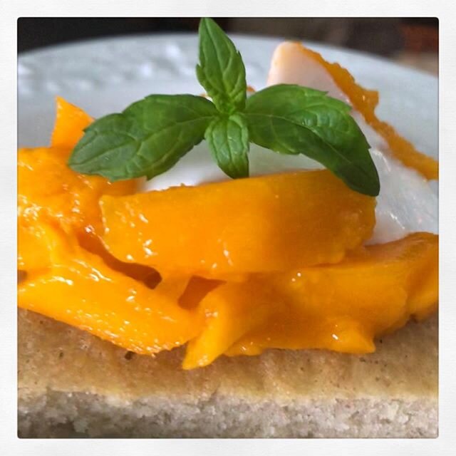 Almond cake with home grown mango, coconut, and mint 💗. Happy graduation to our amazing new teachers!!! We are so proud of you and wish we could share this cake, but instead are sending all our love and gratitude (pretty sweet and also homegrown 😉)