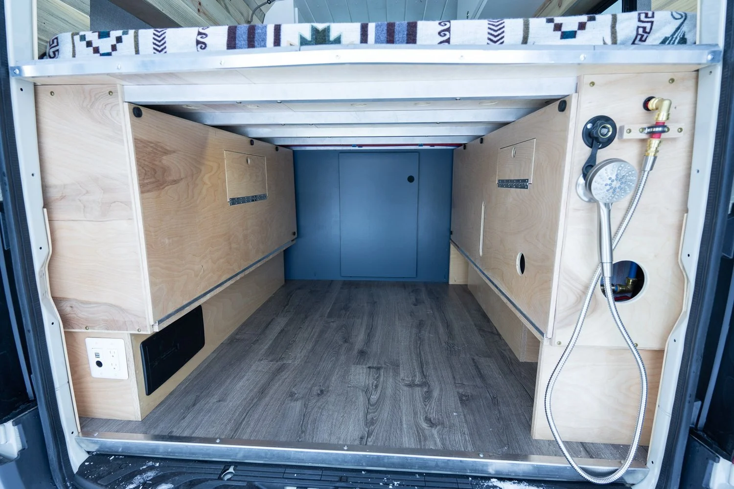 Garage storage area and outdoor shower