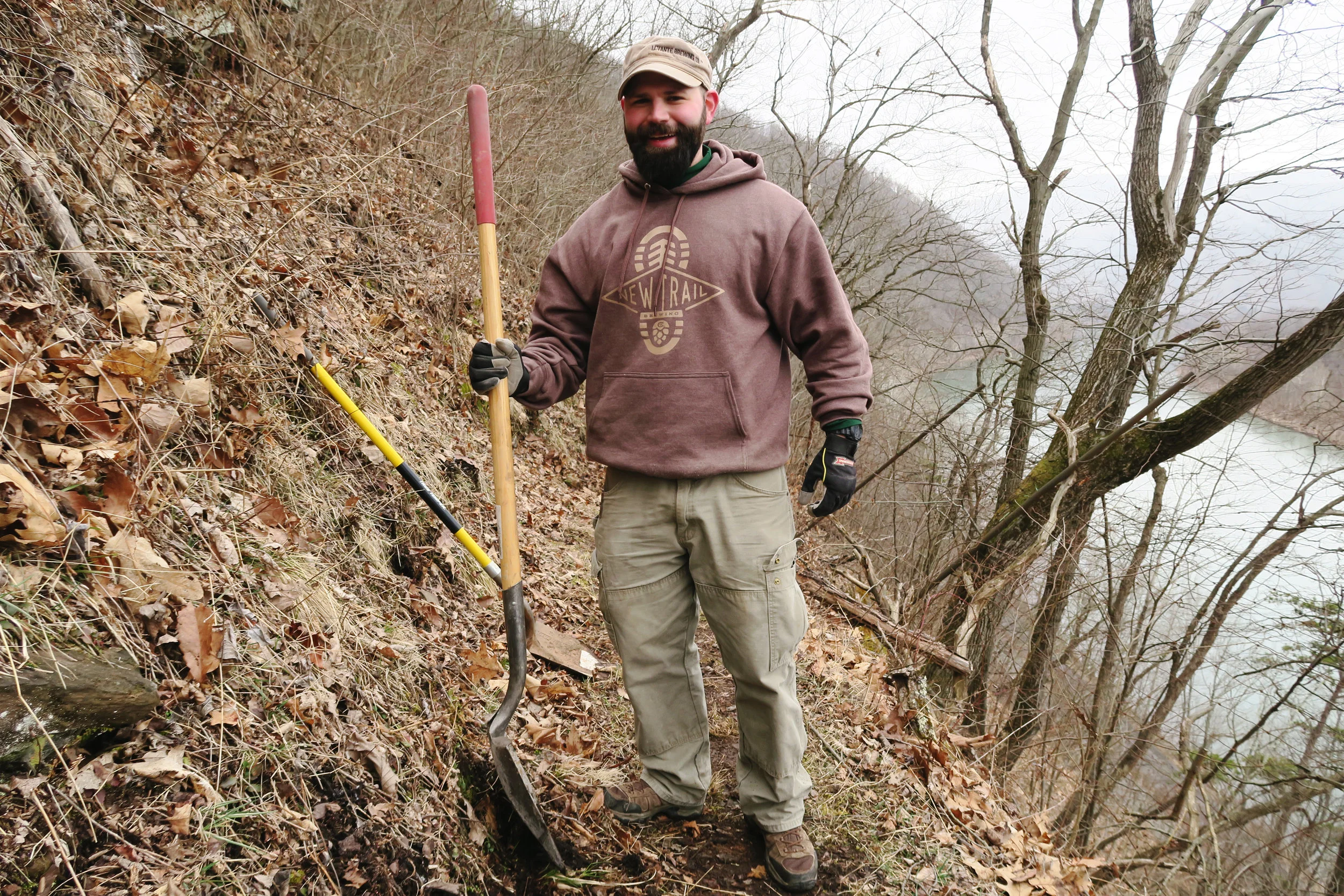 Our New Trail friends digging alongside the PA Trail Dogs at one of our Hyner work days.