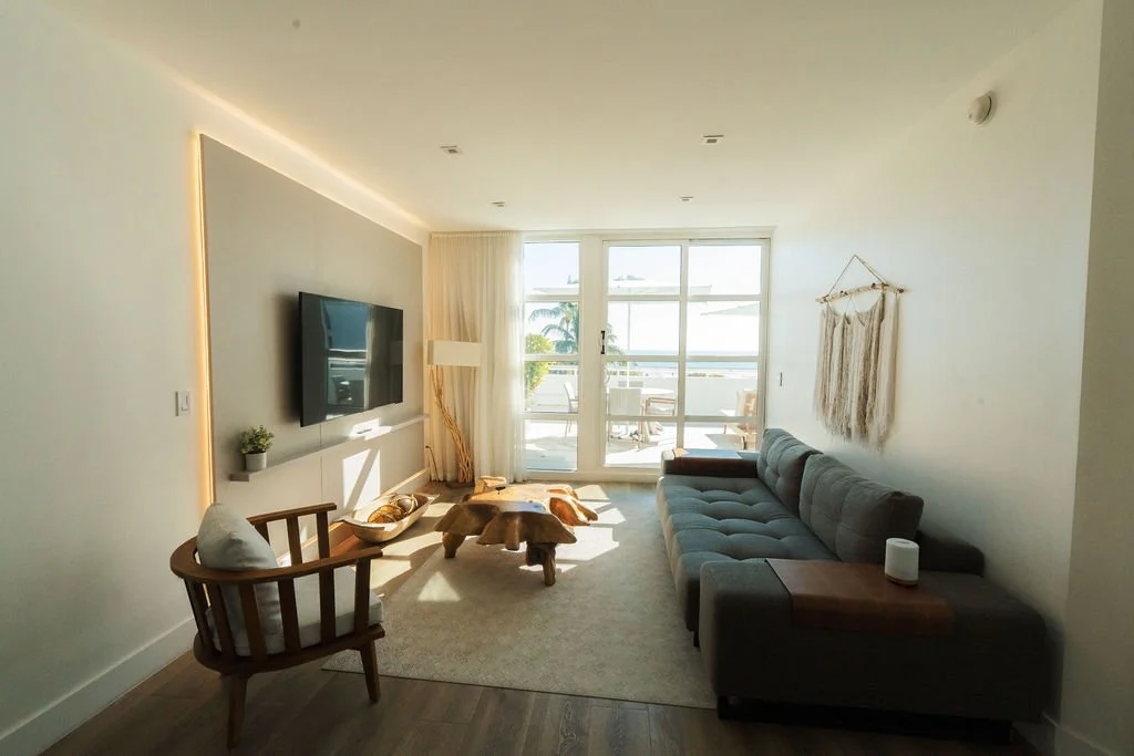 Guest room with natural light and terrace views
