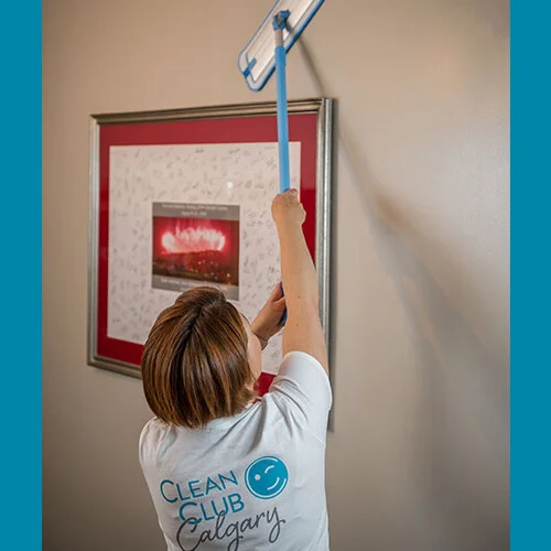 3.Using-mop-to-wash-walls-square.jpg
