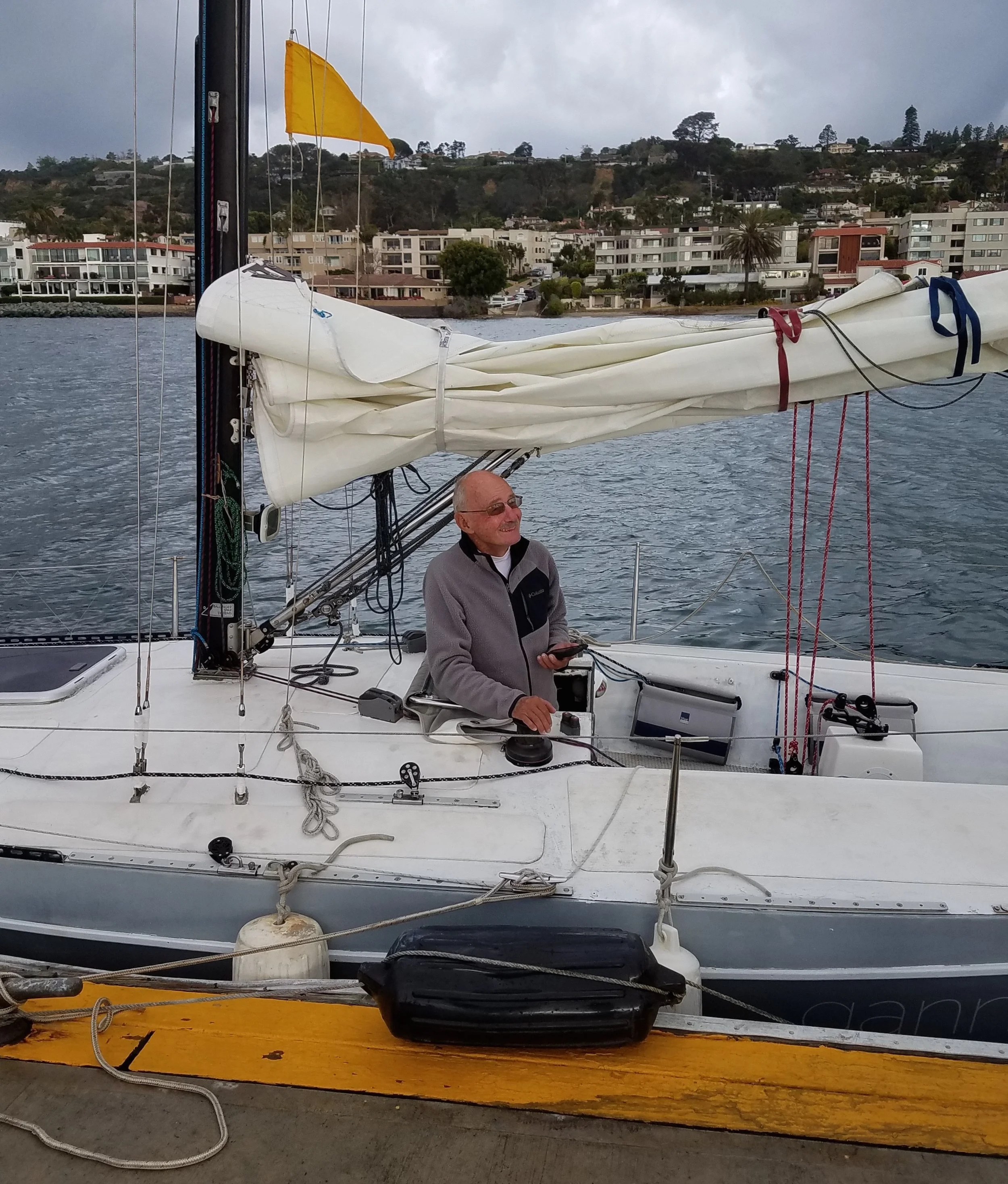 Webb unable to withhold a smile. Image courtesy of Latitude 38