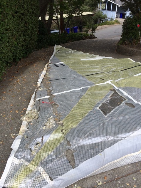The economics of the barn find take a swift turn when the barely used racing sails are unrolled. Rats!