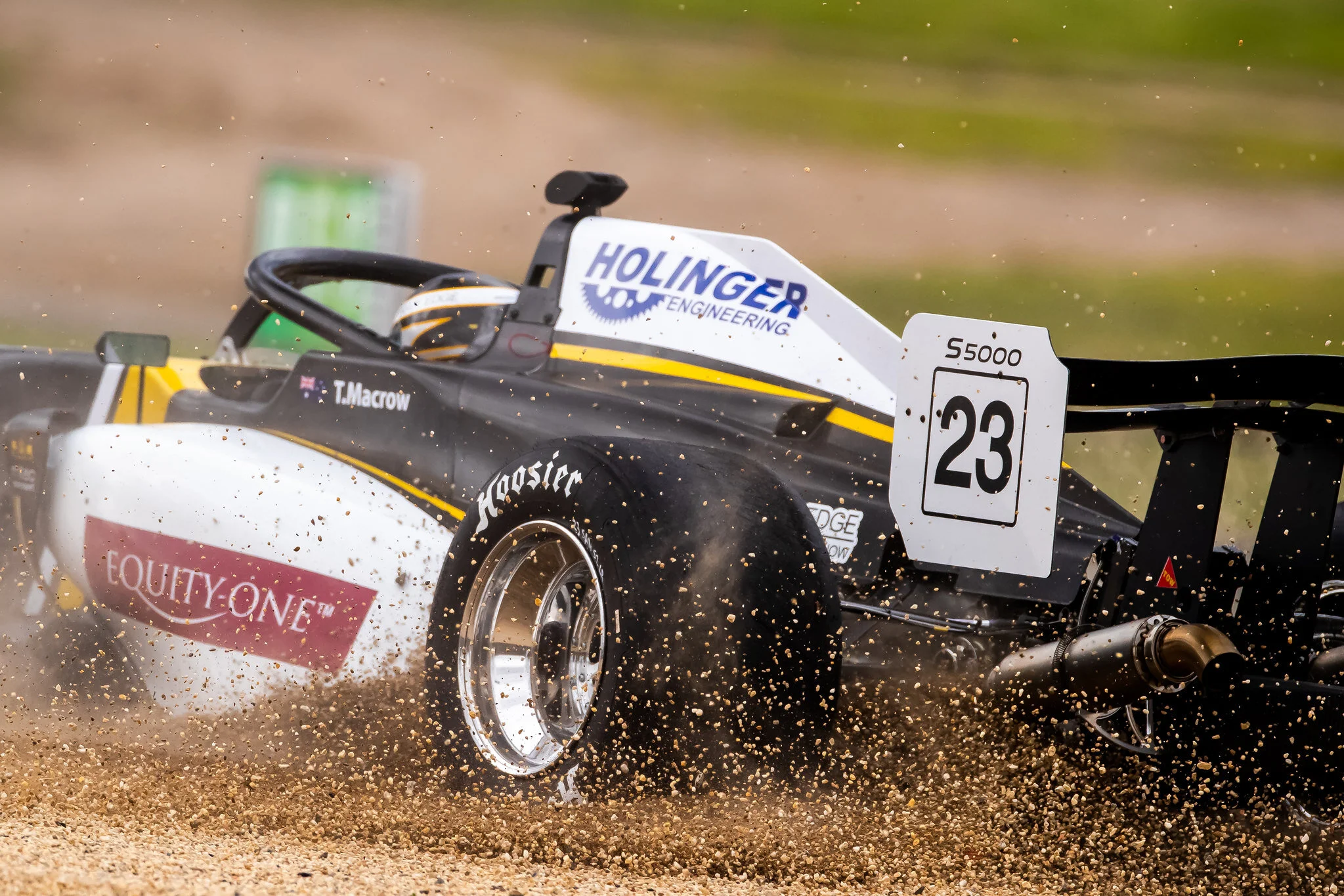 Tim Macrow spins into the gravel. Image: S5000