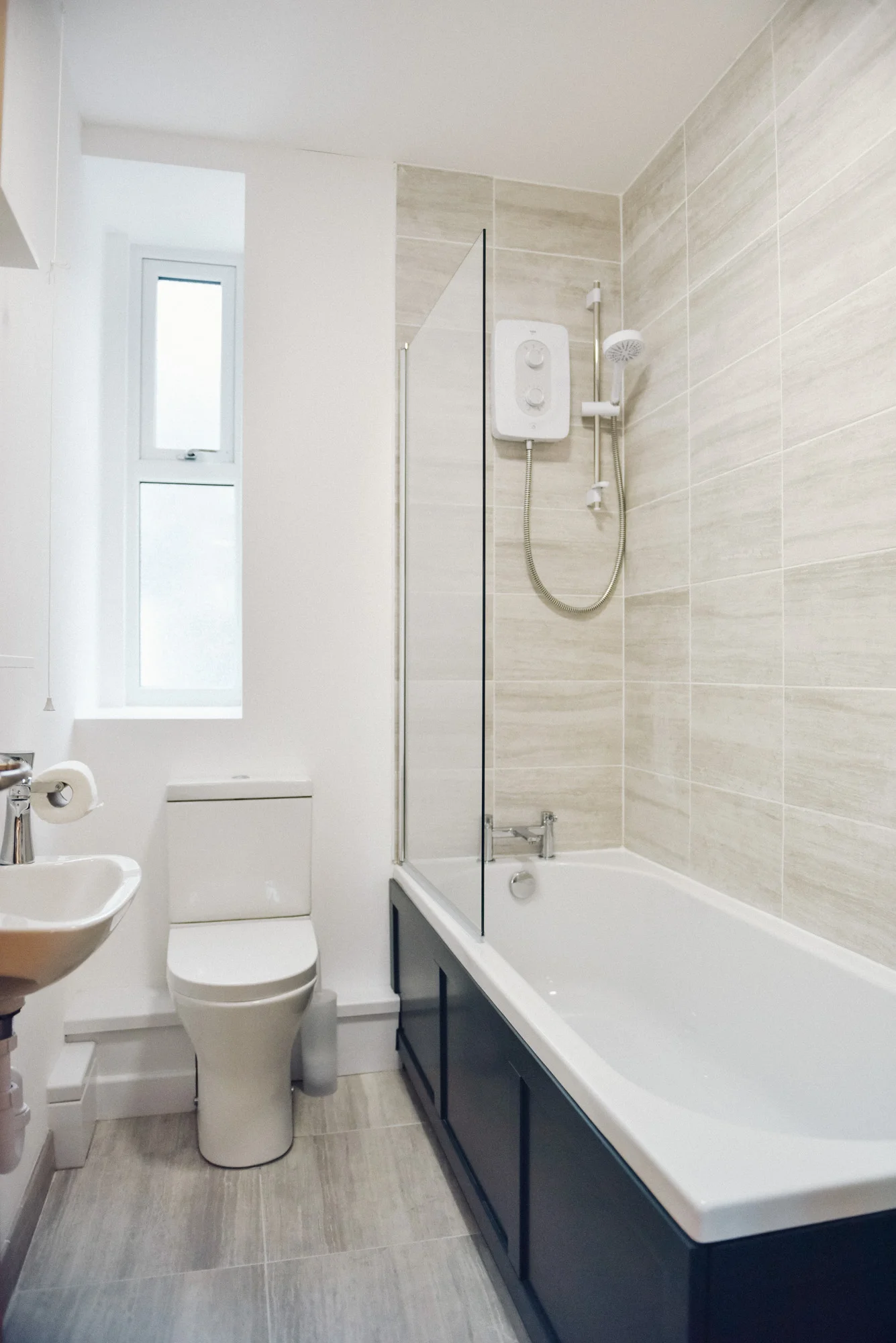 En suite shower-bathroom with toilet