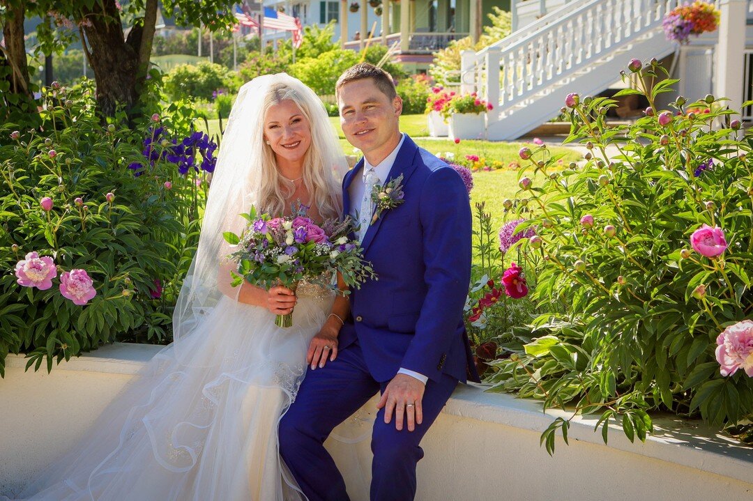 Everything blooms big on Mackinac Island, especially at  Harbour View Inn, a favorite intimate wedding location.  bouquet by St. Ignace In Bloom and photos by Island Photo . #marriedonmackinac #makeitmackinac #destinationwedding #mackinacislandweddin