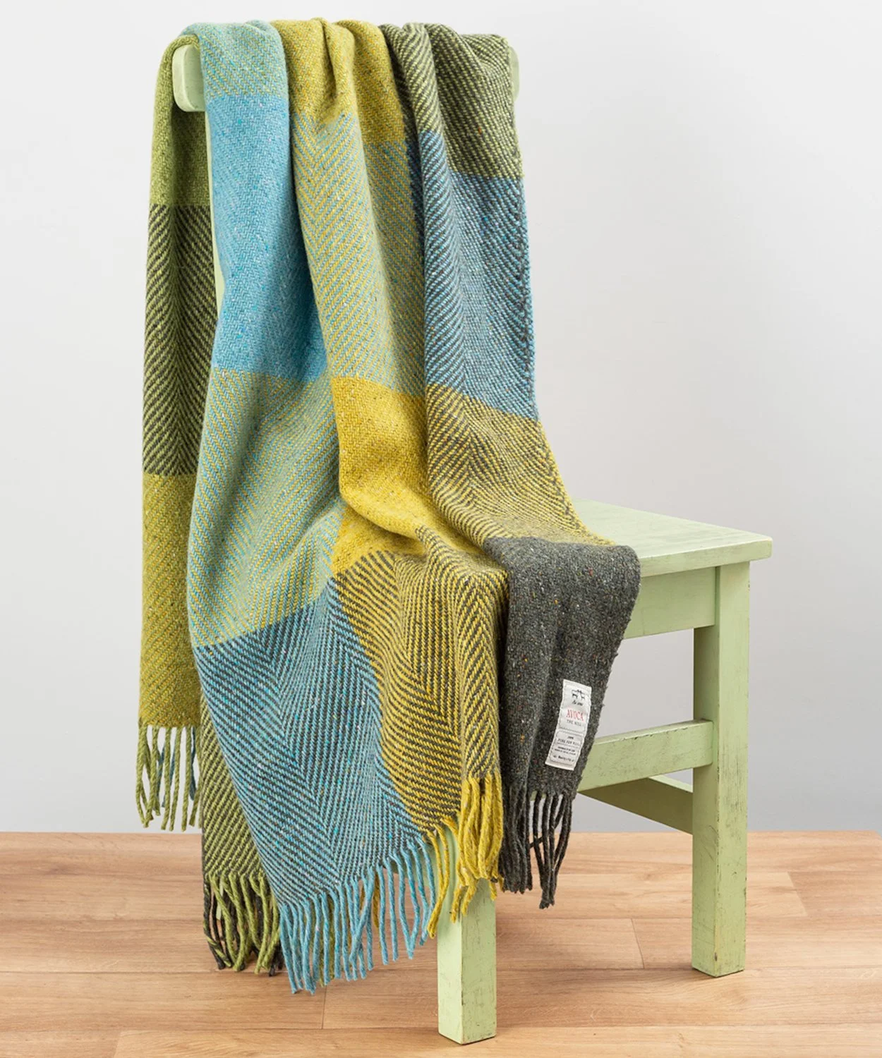 avoca green donegal throw on chair.jpg