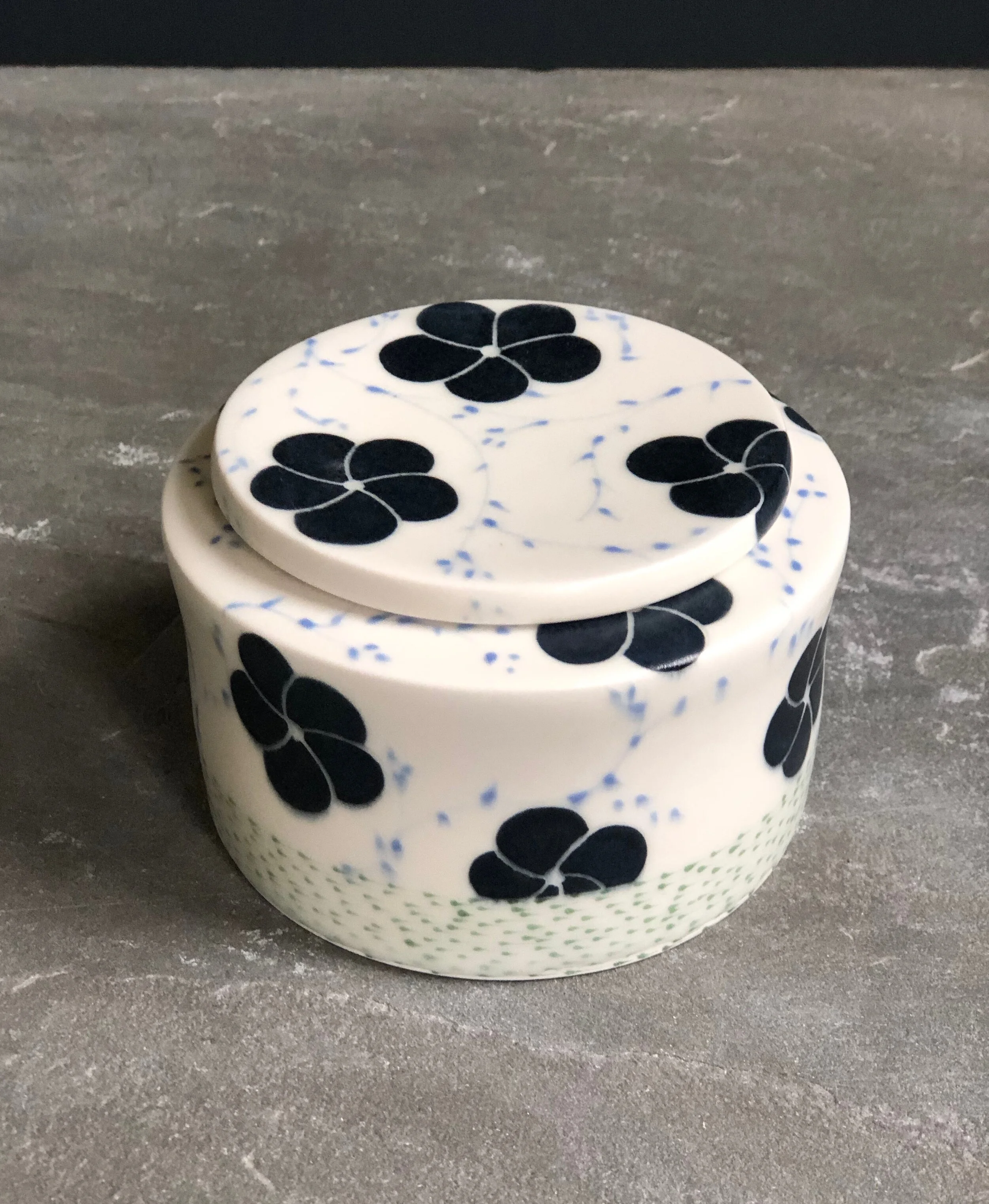 Box With Periwinkle Branches and Black Blossoms 