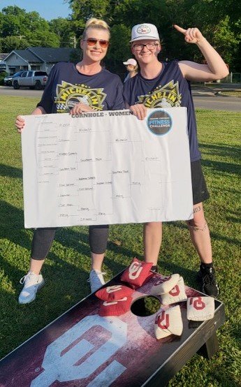 Cornhole - Michelin Women winners with bracket.JPG