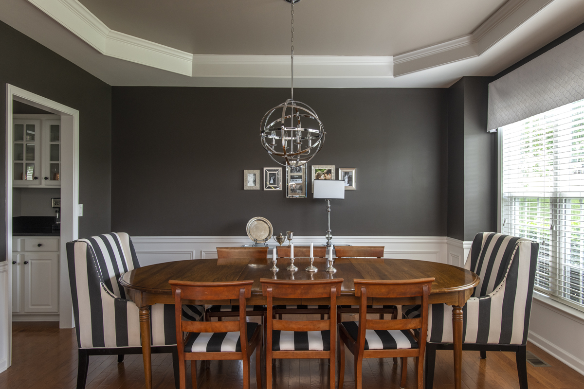 Black walls! I had so much fun experimenting with black walls at this house thanks to all the natural lighting and open space. Another thing to note - this table was Chris’ grandparents (learn more about them in my First Home Tour post ) and the table behind it (which you can’t really see) was my great grandmother’s.