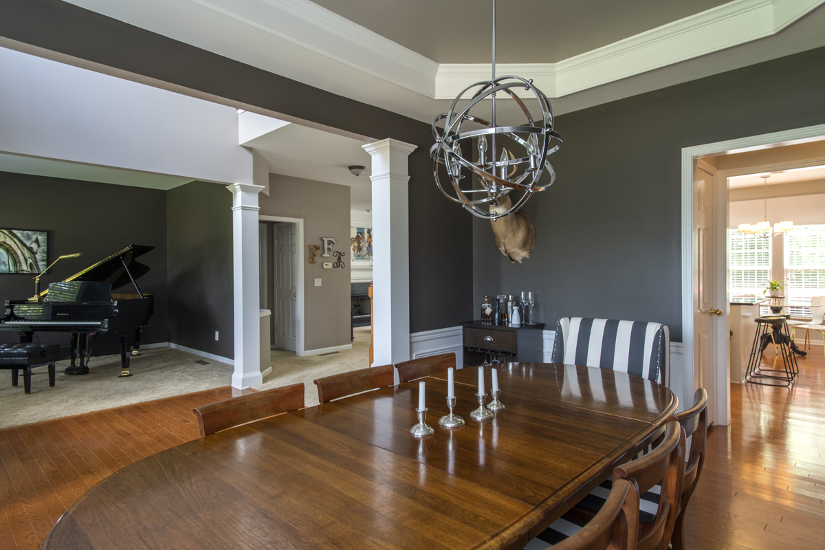 One of my favorite things about this house was being able to stand in one room and see into several others at the same time! Props to Chris for picking out this light fixture. He hated the one before SO much (it had beaded tassels) that he went out on his own and got this one!