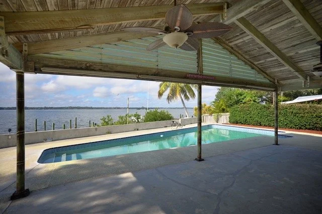 pool covered porch.jpeg